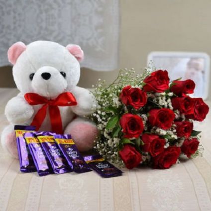 12 Red Roses and 5 Chocolates and 6 inch teddy